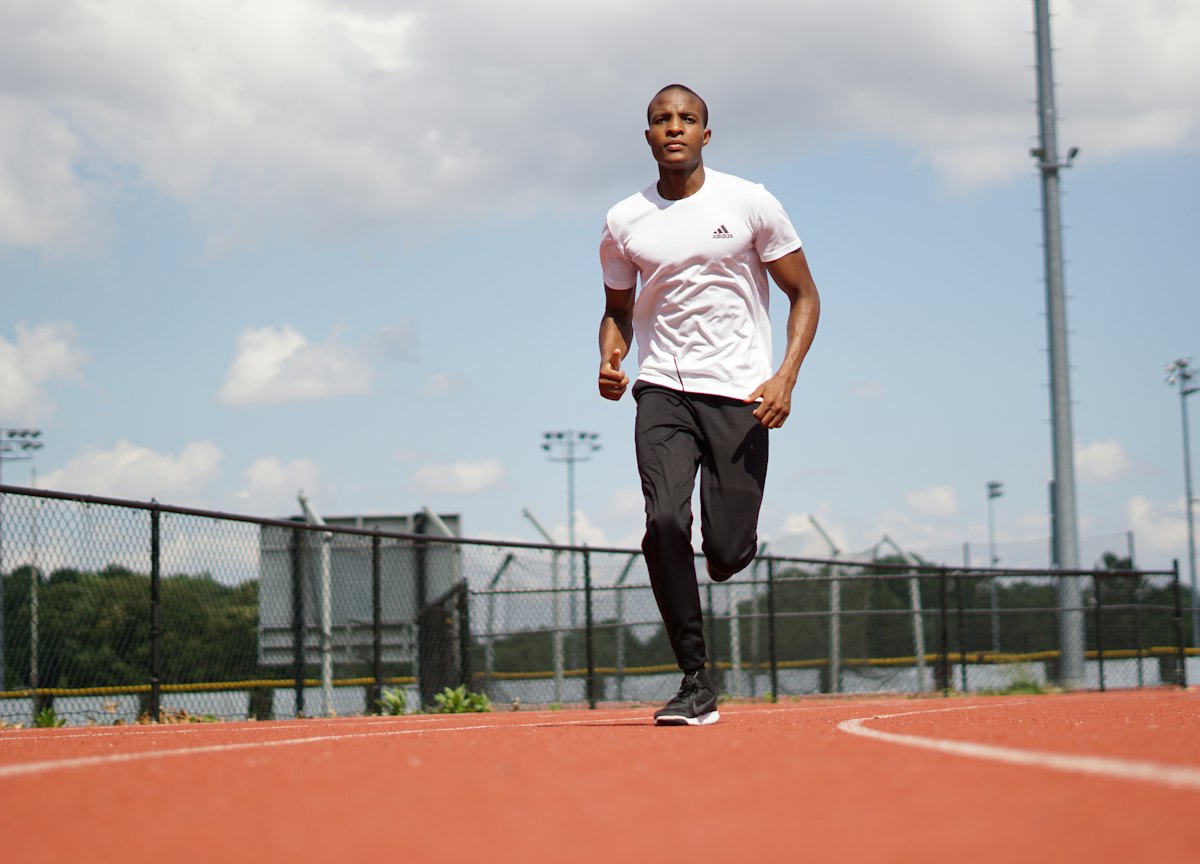 Runner in a white sports T-shirt